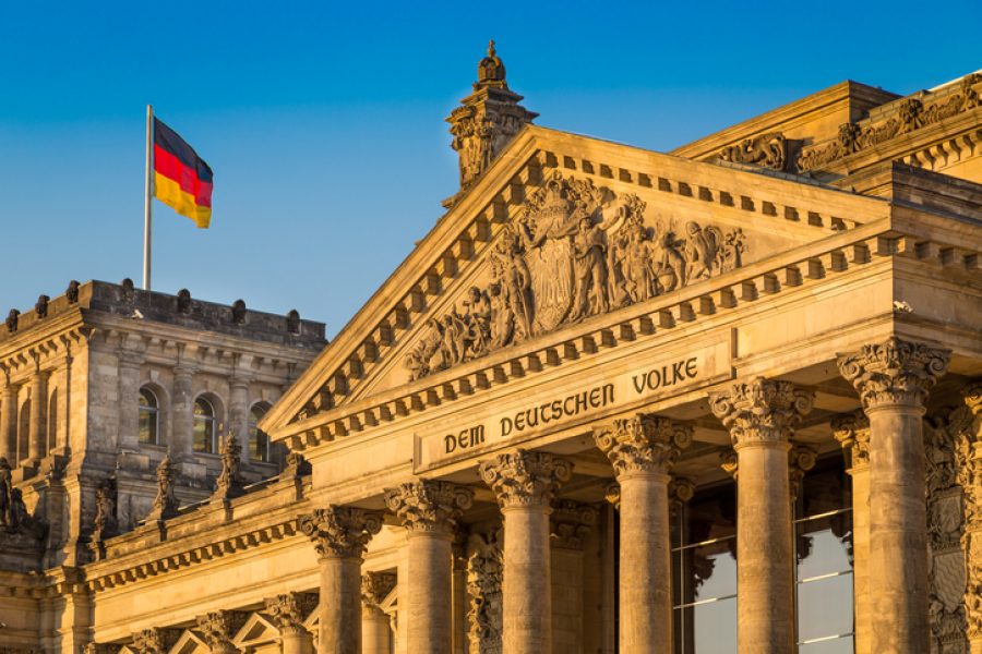 Close-up view of famous Reichstag building, seat of the German Parliament (Deutscher Bundestag), in beautiful golden evening light at sunset, Berlin, Germany.